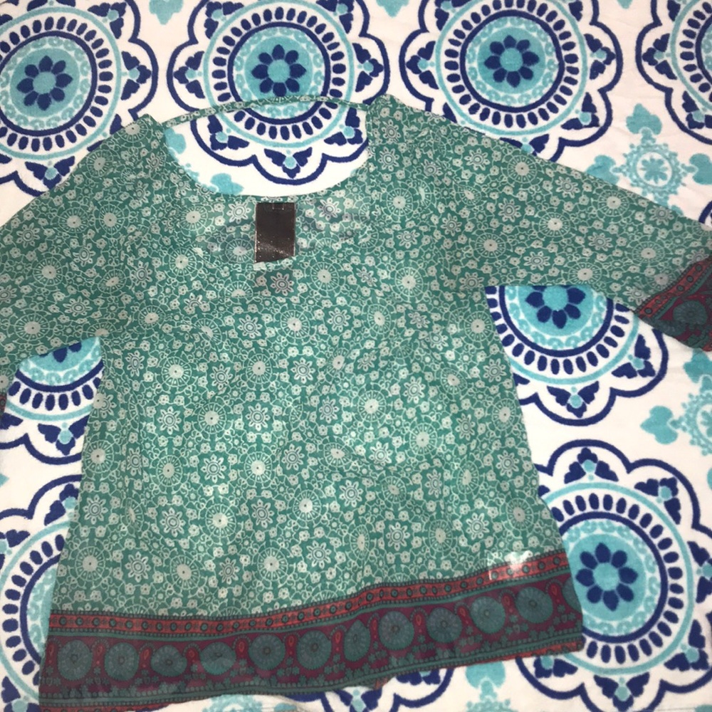 Adorable sheer green shirt.